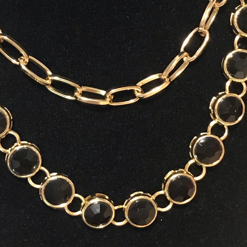 Linked gold and black stone necklaces